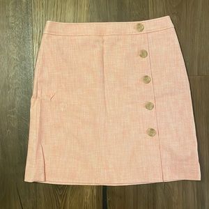 Pink skirt with button detail
